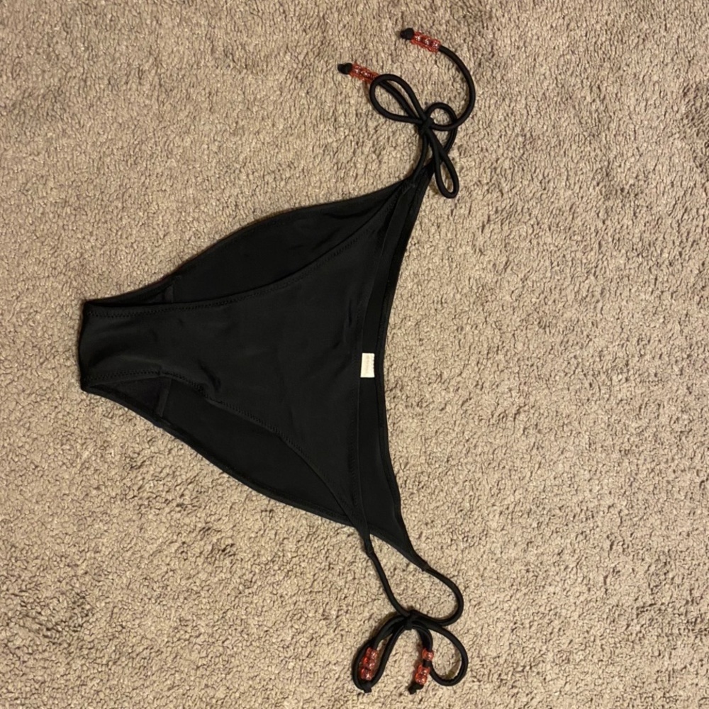Black bikini bottom with tied sides and pink beads